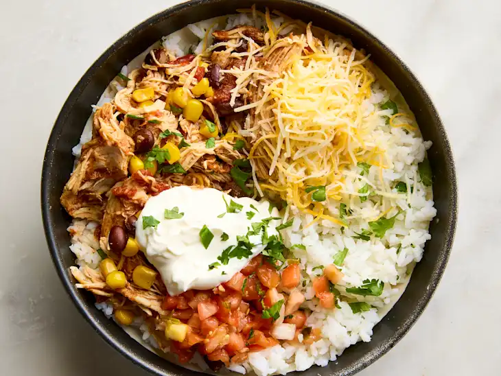 Slow Cooker Chicken Burrito Bowls with Tender Chicken and Black Beans