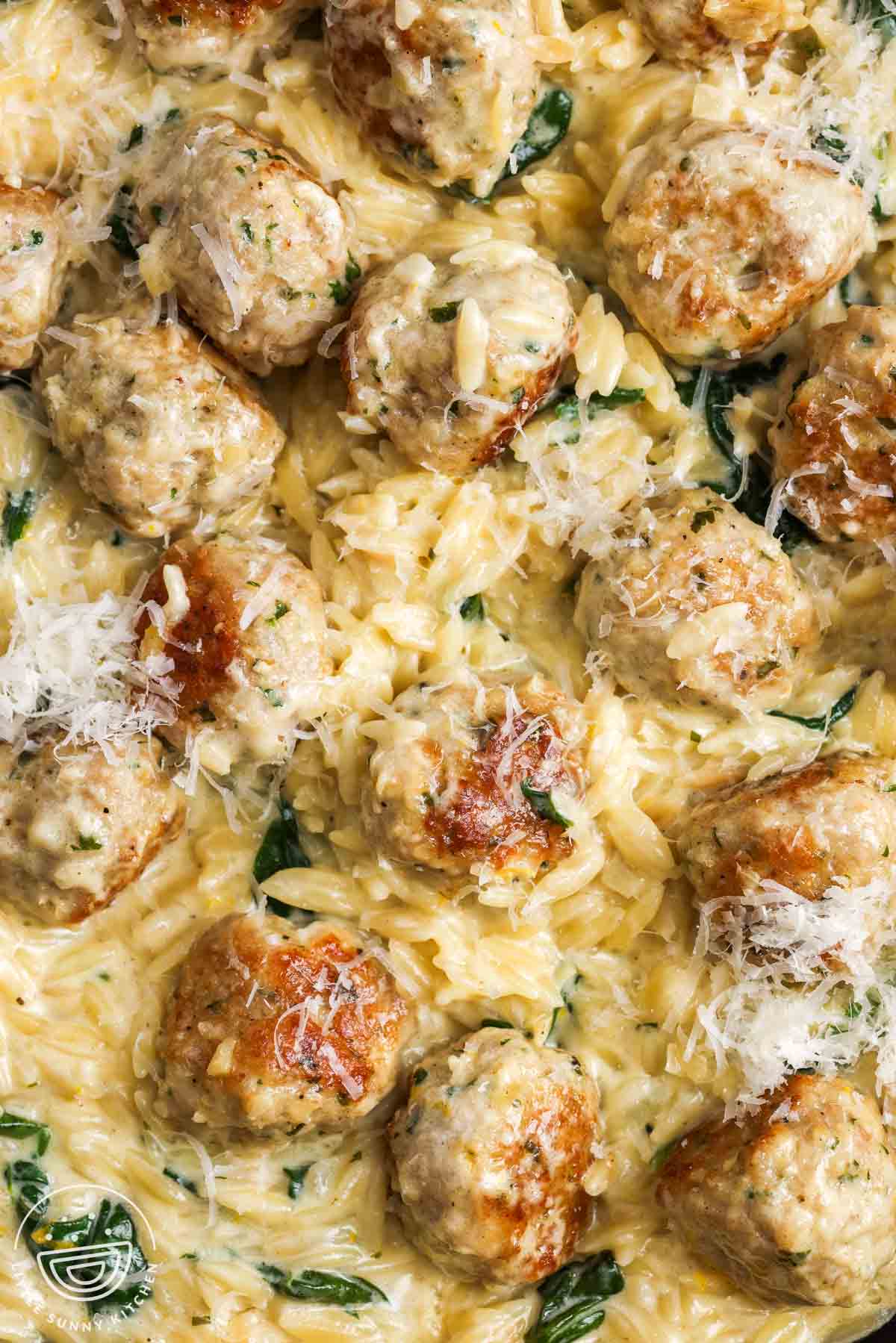 One Pan Lemon Chicken Meatballs and Orzo with Creamy Parmesan Spinach