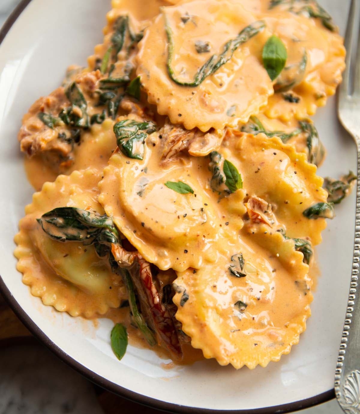 Creamy Tuscan Ravioli with Sun-Dried Tomatoes and Basil