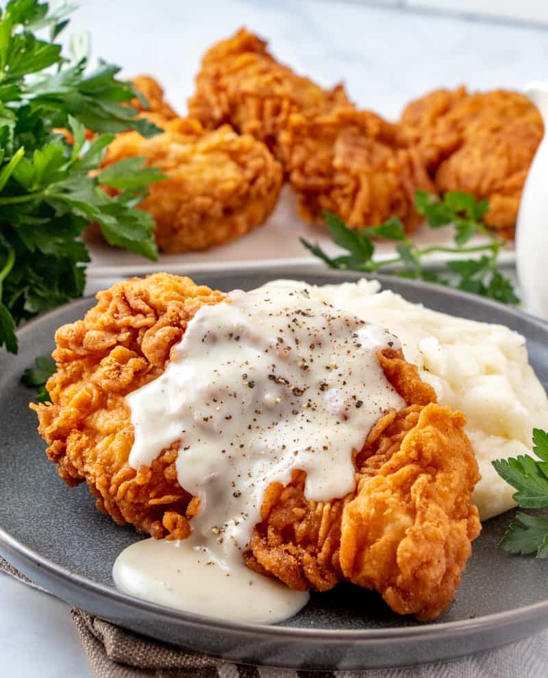 Chicken Fried Chicken with Crisp Golden Coating and Country Gravy