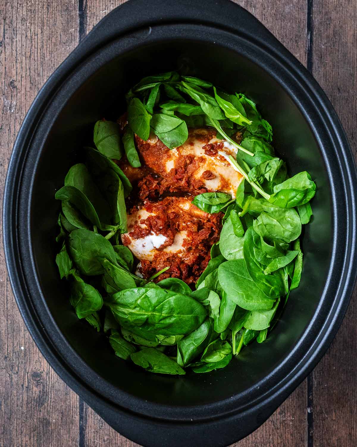 Slow Cooker Pesto Chicken with Sun-Dried Tomatoes and Creamy Parmesan