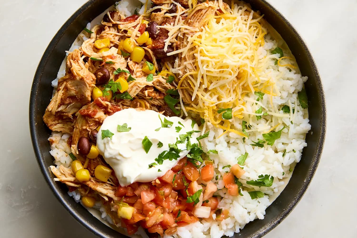 Slow Cooker Chicken Burrito Bowls with Tender Chicken and Black Beans