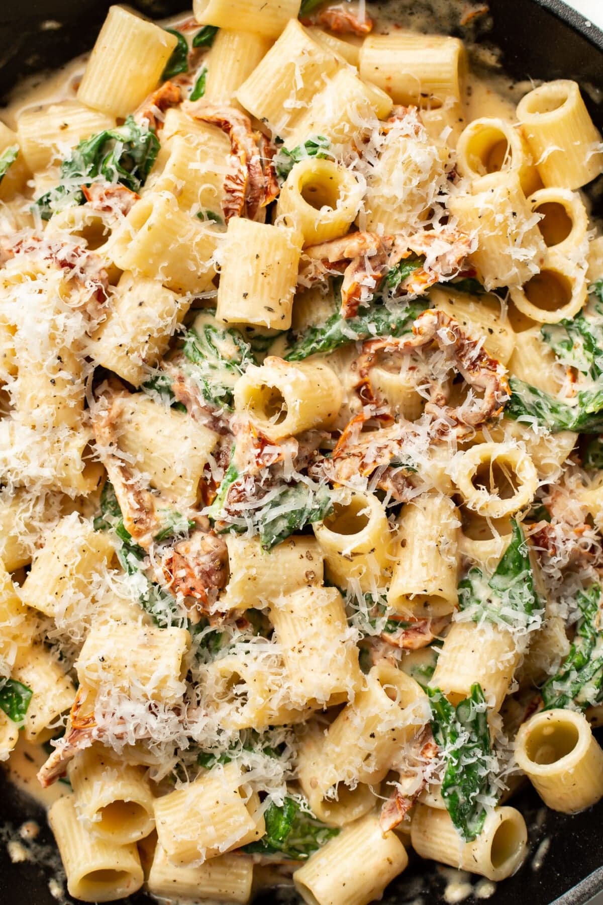 Sun-Dried Tomato Pasta with Creamy White Wine Sauce and Spinach