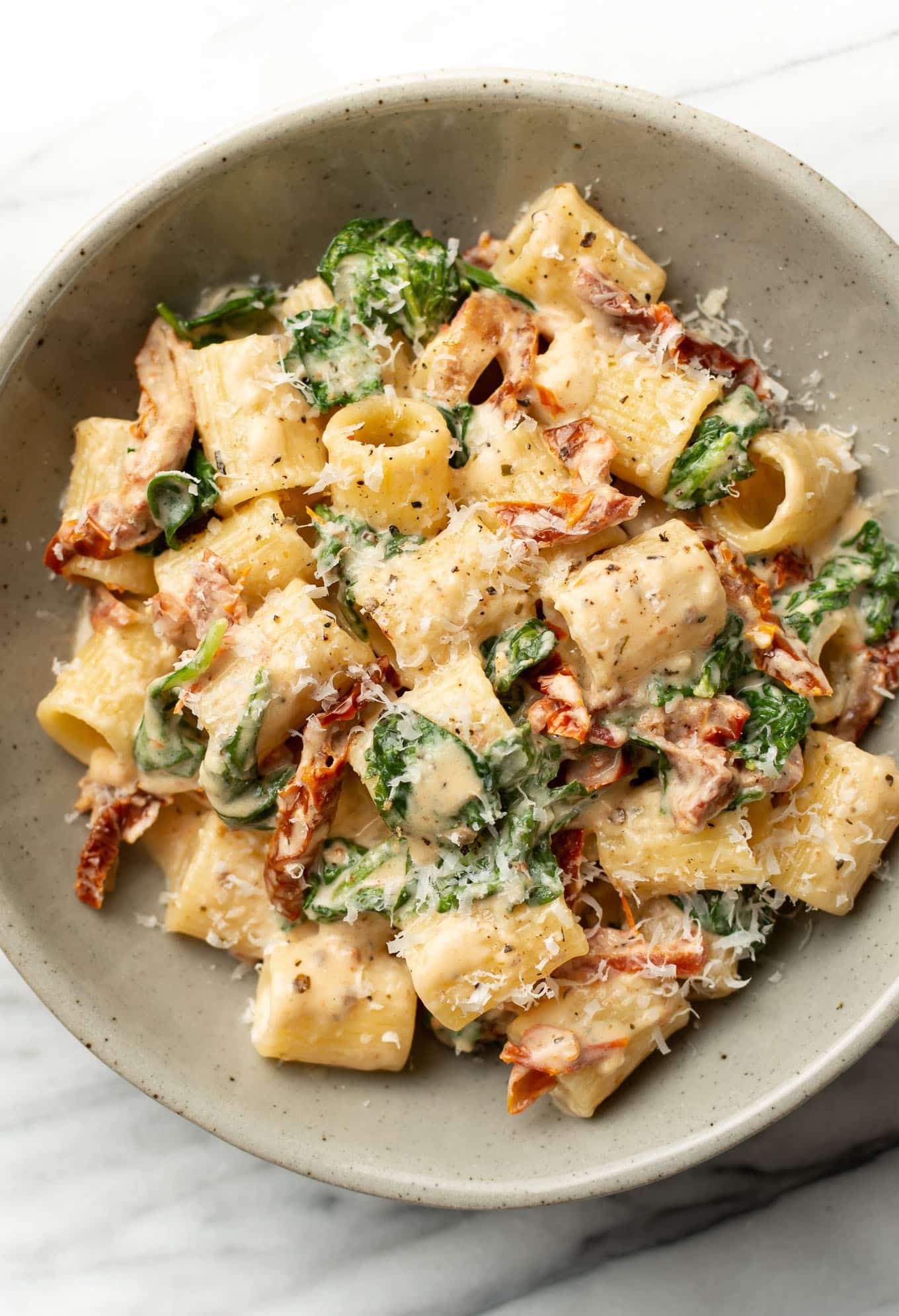 Sun-Dried Tomato Pasta with Creamy White Wine Sauce and Spinach